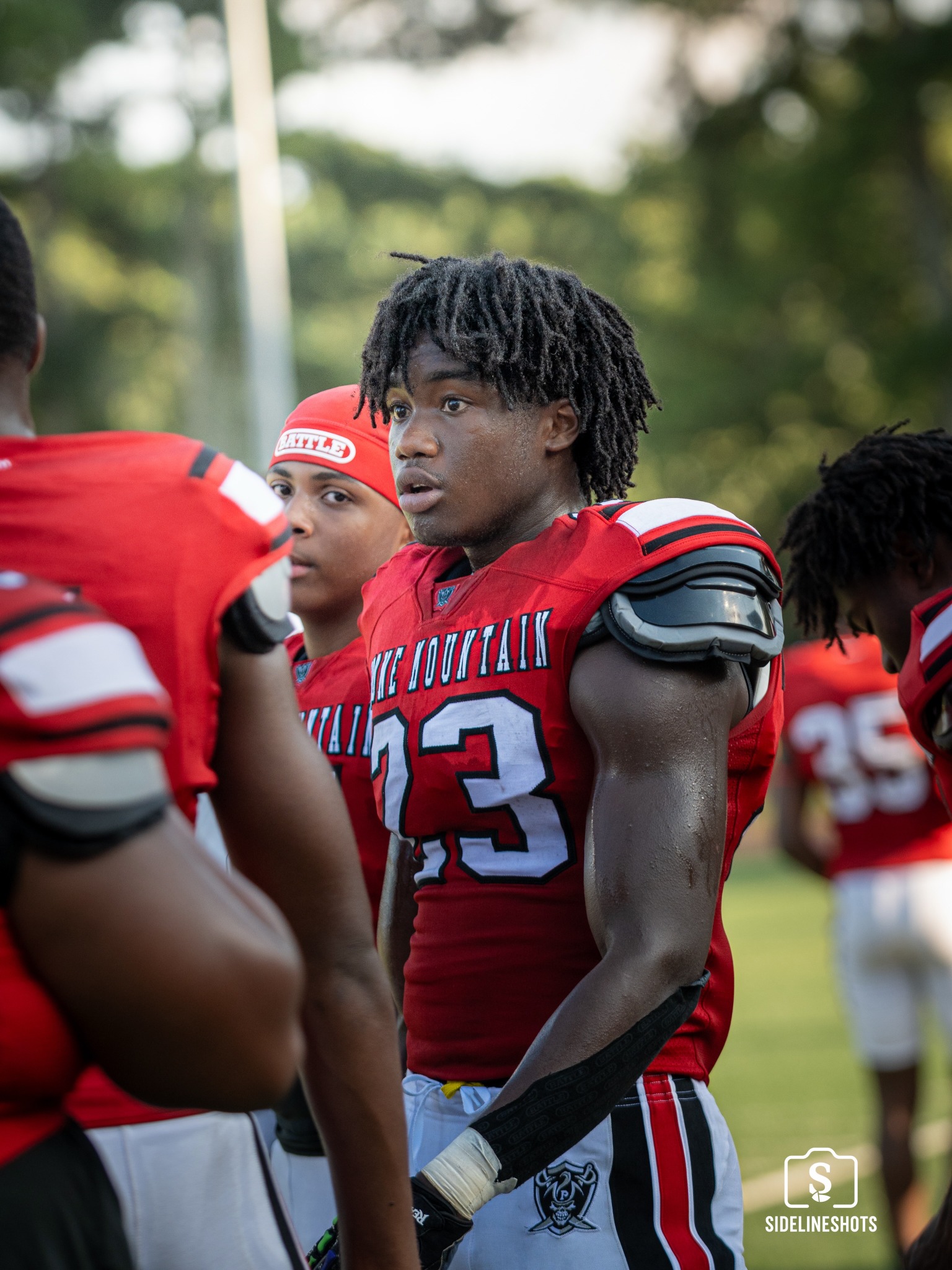 Stone Mountain number 23 on the sideline
